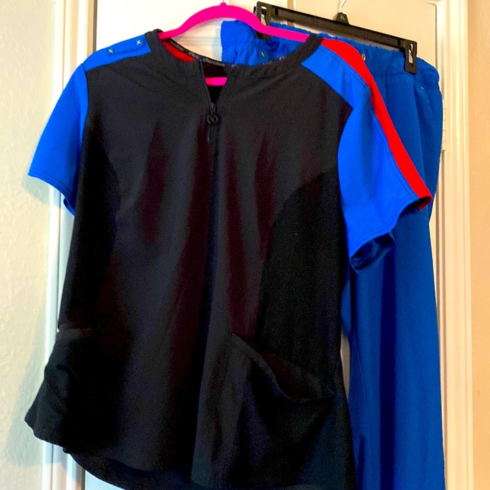 Scrub set blue with red and black good condition. Stretchy fit XL top and pants